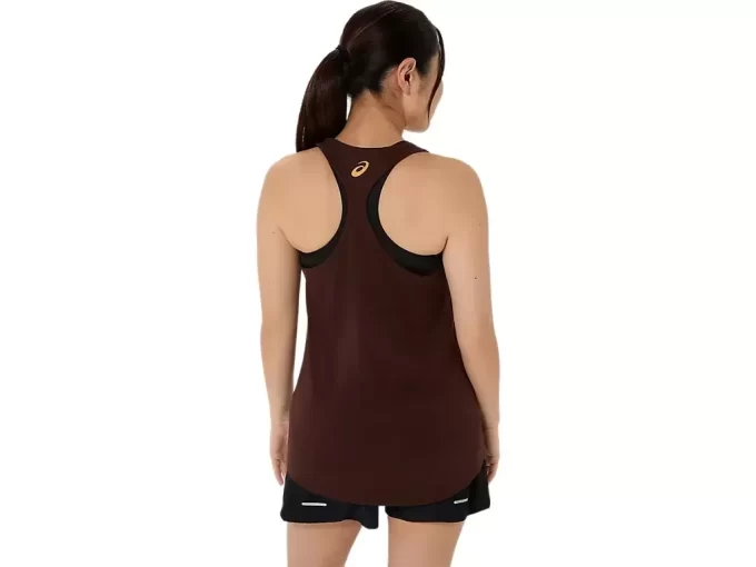 NAISTEN AURINGONKUKKA-TOPPI