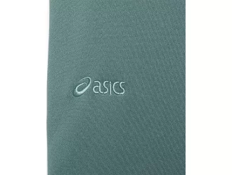 Sivulla nappikiinnityksellä varustetut neulehousut