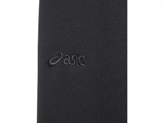 Sivulla nappikiinnityksellä varustetut neulehousut