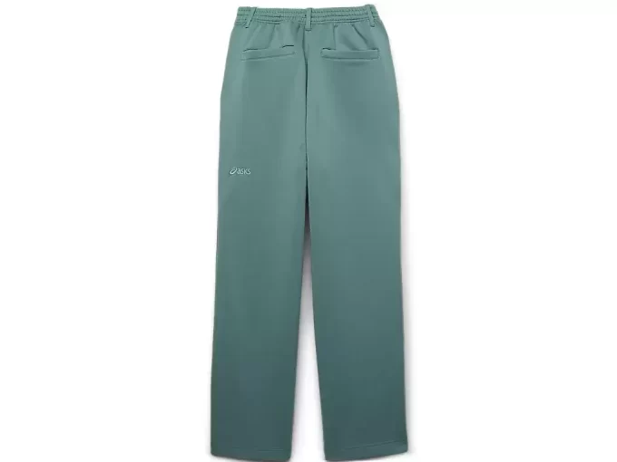 Sivulla nappikiinnityksellä varustetut neulehousut